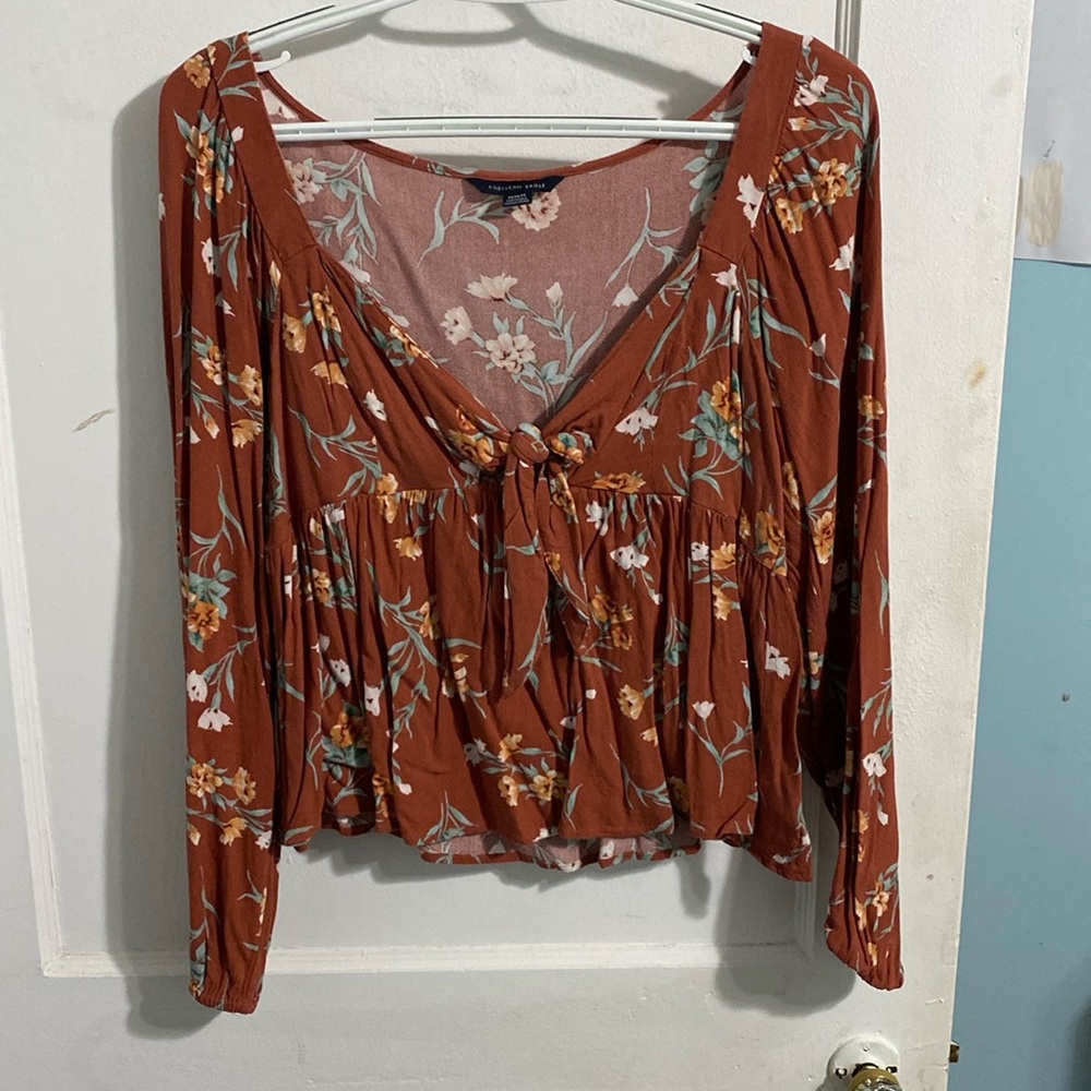 American eagle shirt with cut out in center